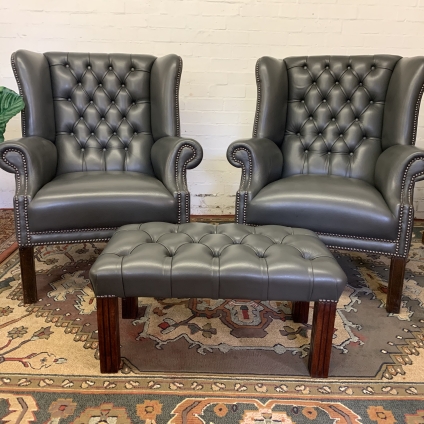 Quality Pair Of Grey Leather Wingback Chesterfield Armchairs And Footstool - Now Sold