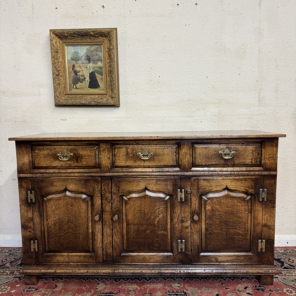 OUTSTANDING QUALITY OAK THREE DOOR THREE DRAWER SIDEBOARD