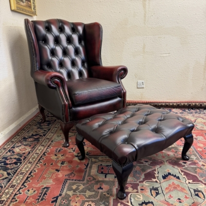 QUALITY OXBLOOD LEATHER CHESTERFIELD WINGBACK ARMCHAIR AND FOOTSTOOL