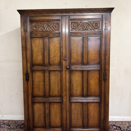 QUALITY TITCHMARSH AND GOODWIN CARVED OAK TWO DOOR WARDROBE