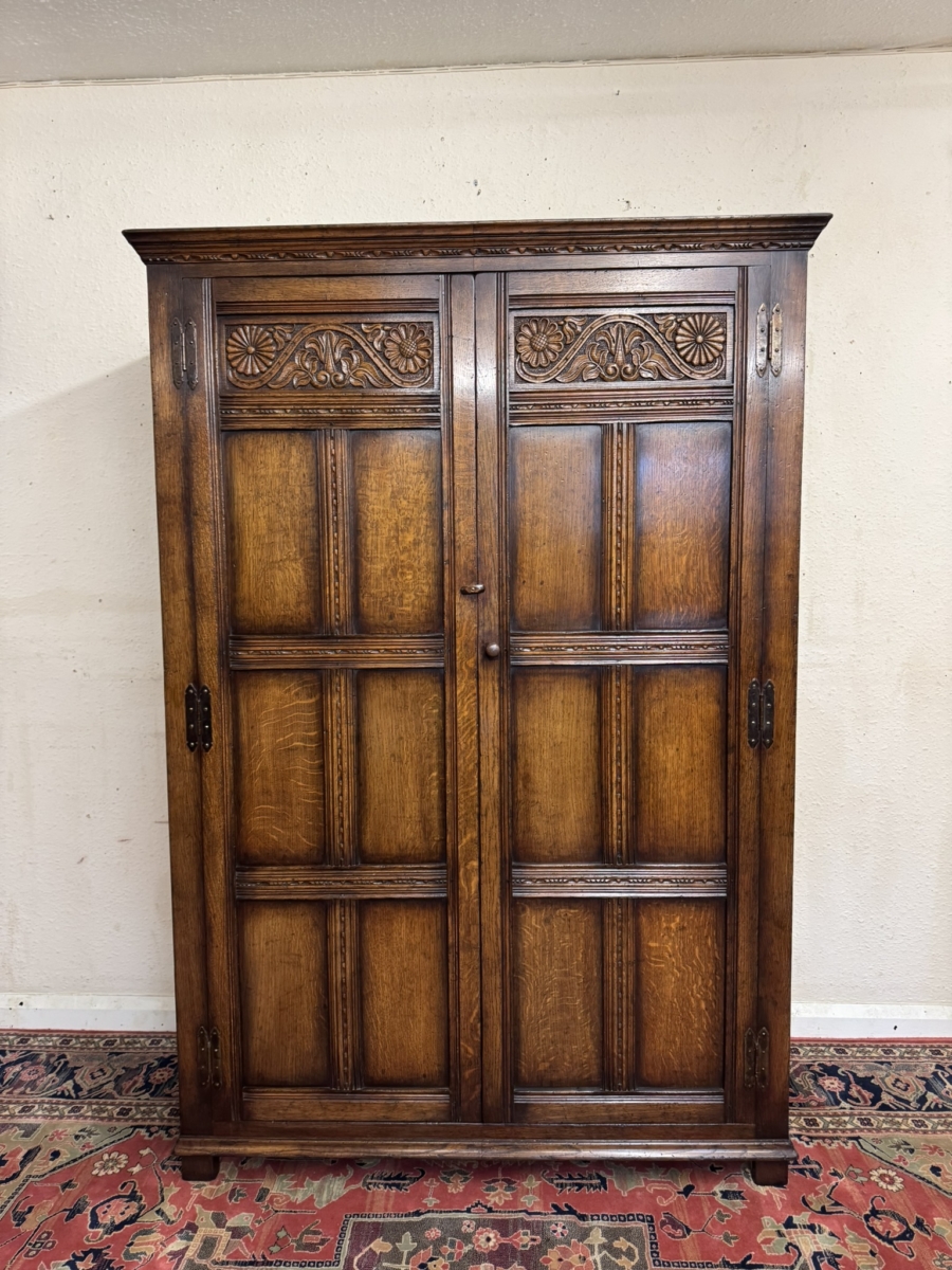 QUALITY TITCHMARSH AND GOODWIN CARVED OAK TWO DOOR WARDROBE