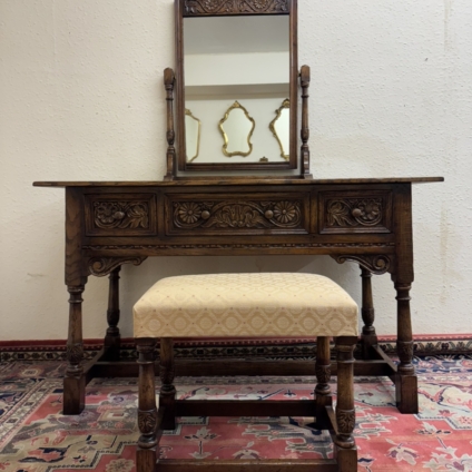 QUALITY TITCHMARSH AND GOODWIN CARVED OAK DRESSING TABLE AND STOOL