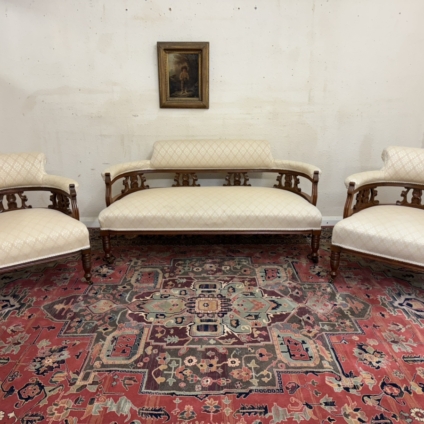 QUALITY ANTIQUE CARVED WALNUT SETTEE WITH TWO MATCHING ARMCHAIRS CIRCA 1890