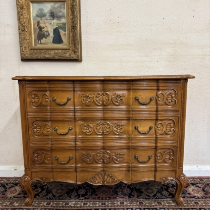 FABULOUS FRENCH CARVED OAK SERPENTINE SHAPED CHEST OF THREE DRAWERS CIRCA 1950