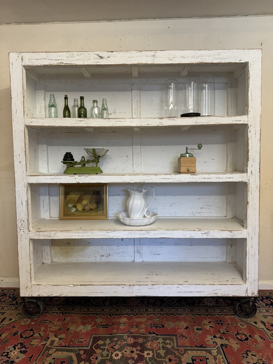 LARGE FRENCH RUSTIC OPEN SHELVING ON IRON INDUSTRIAL WHEELS