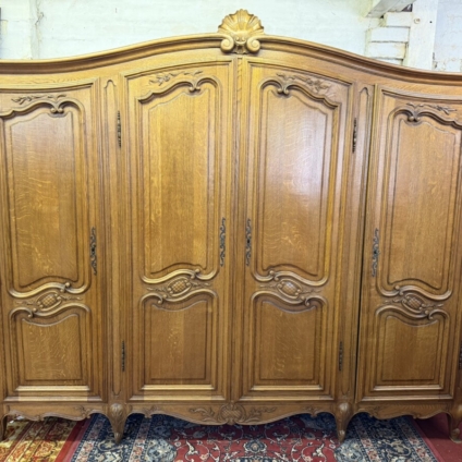 QUALITY FRENCH CARVED OAK FOUR DOOR ARMOIRE/WARDROBE CIRCA 1950
