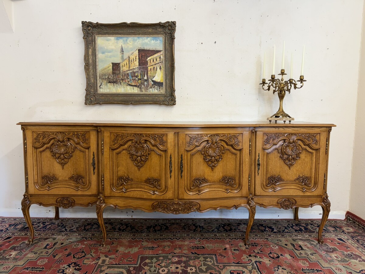 ANTIQUE FRENCH SHAPED CARVED OAK FOUR DOOR ENFILADE/CREDENZA CIRCA 1930