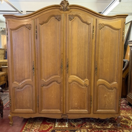 QUALITY FRENCH CARVED OAK FOUR DOOR ARMOIRE/WARDROBE CIRCA 1950