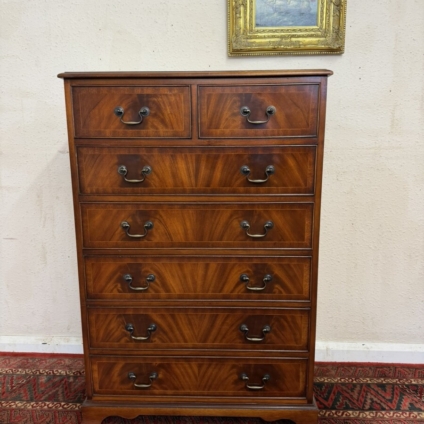 INLAID FLAME MAHOGANY TALL CHEST OF TWO SHORT AND FIVE LONG DRAWERS