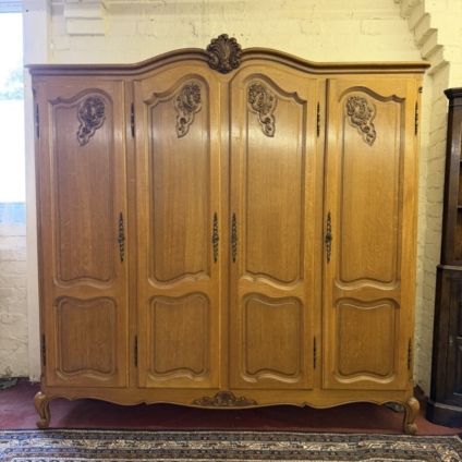 FRENCH CARVED OAK FOUR DOOR ARMOIRE/WARDROBE