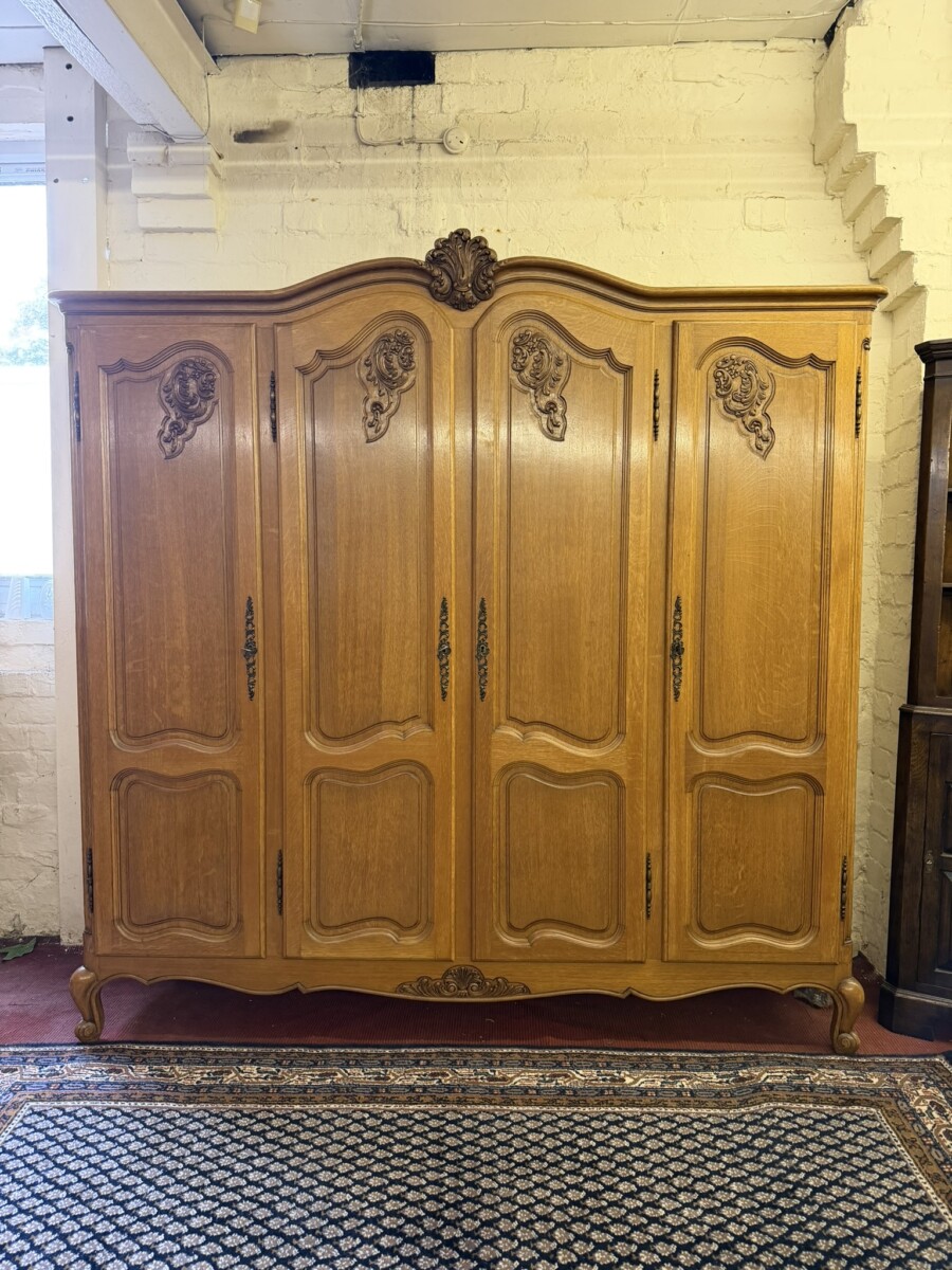 FRENCH CARVED OAK FOUR DOOR ARMOIRE/WARDROBE