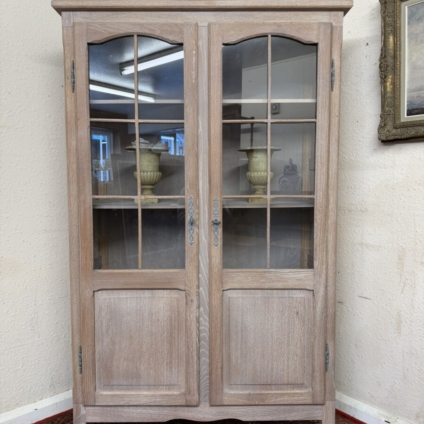 FRENCH LIMED OAK TWO-DOOR GLAZED BOOKCASE/CABINET